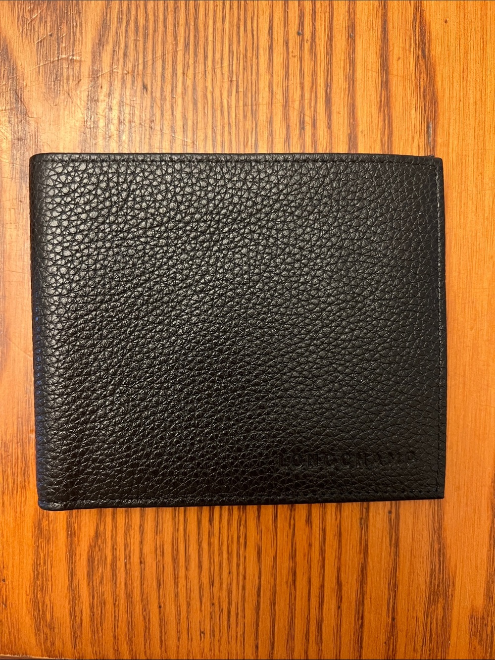Longchamp Black Pebbled Leather Bi-Fold Card Holder